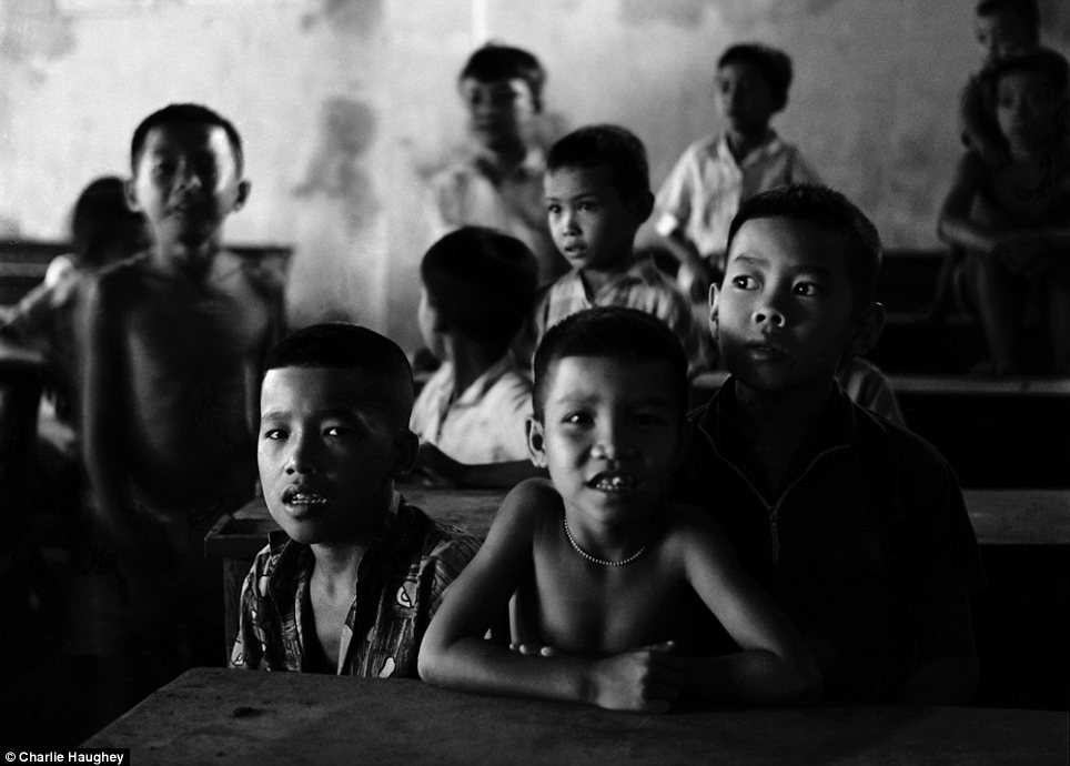 Learning: Vietnamese children in a schoolroom as a bitter civil war raged around them