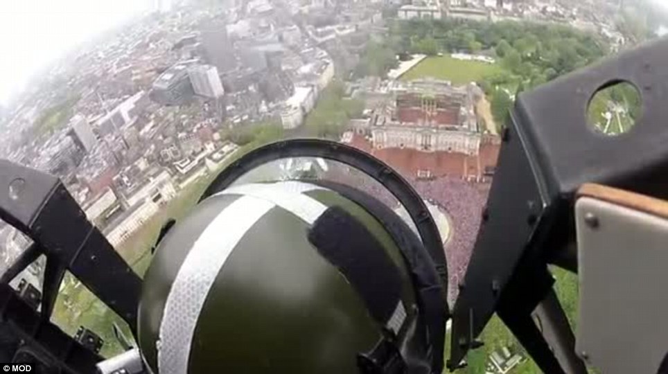 Target in sight! The nose of the Lancaster passes over the Mall and towards Buckingham Palace during the climax of its flypast